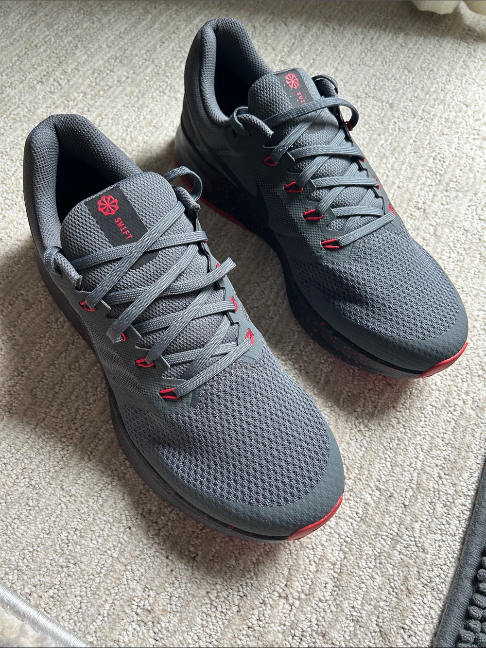 Men's Grey Athletic Running Shoes with Red Accents